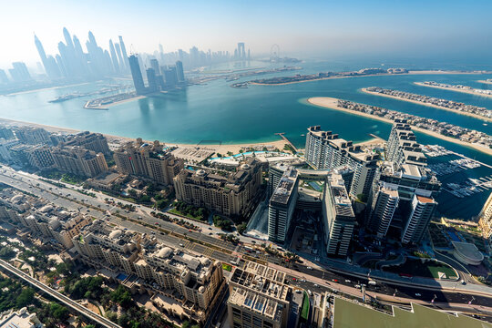 The Palm island panorama with Dubai marina rising in the background aerial view © diy13