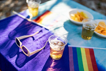 LGBT pride parade party with rainbow flag