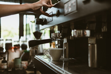 espresso machine in coffee shop counter offering freshly brewed coffee. coffee maker concept.