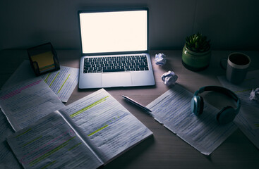 Laptop, mockup and desk for studying at night in student dormitory, dark room and technology....