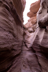 Fantastically beautiful landscape in the national nature reserve - Red Canyon in the rays of the setting sun, near the city of Eilat, in southern Israel