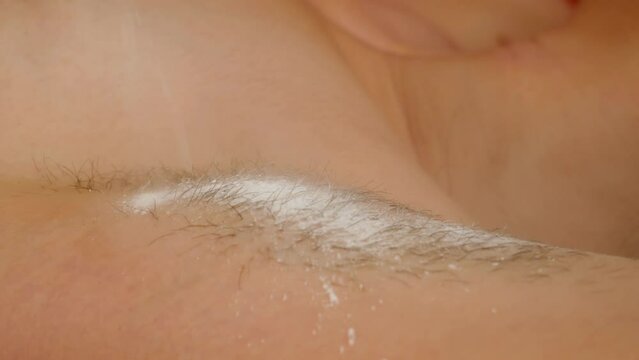 Sugaring, sugar waxing, or Persian waxing. Close up cosmetic procedure.
