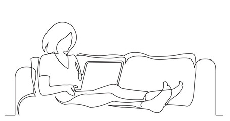 continuous line drawing vector illustration with FULLY EDITABLE STROKE of woman lying on sofa with laptop working from home