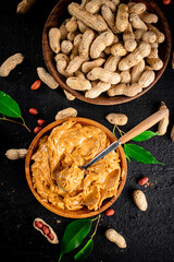 Peanut butter in a wooden plate. 