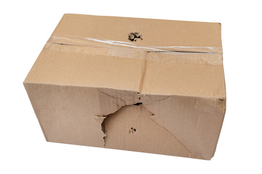 Damaged and torn shipping carton. Isolated on a white background. Box was broken in transit.