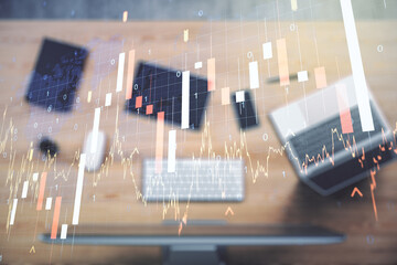 Multi exposure of abstract financial graph with world map on modern computer background, financial and trading concept