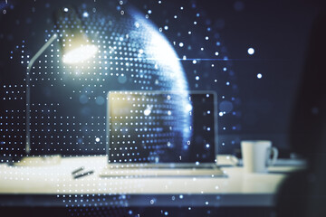 Abstract creative world map on modern laptop background, international trading concept. Multiexposure