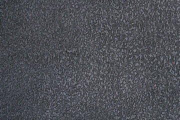 The texture of the black plastic ribbed surface for background