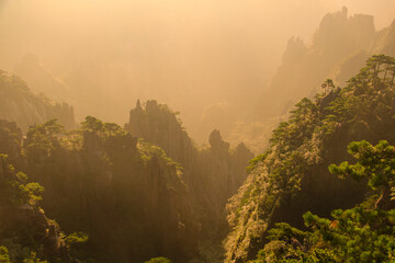 Sunrise in the morning fog, taken at the top of Mount Huang(Guangming top), Huangshan, Hefei, China.