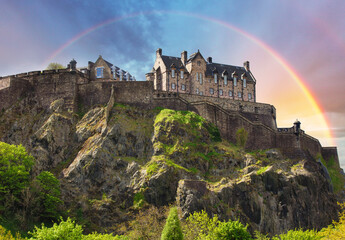 Scotland - Rainbow over Edinburgh Castle with green garden, UK