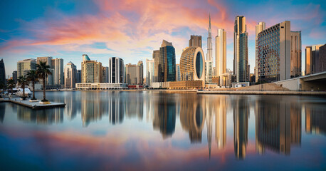 Dubai skyline with reflection at dramatic sunset,  UAE - 564180177