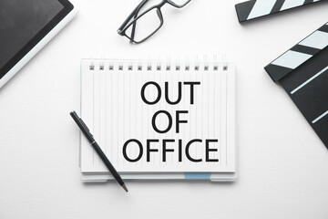 Out Of Office on notepad. Business concept
