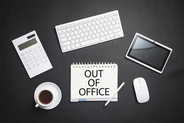 Out Of Office on notepad. Business concept