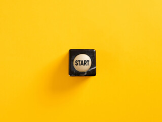 The word start on a marble cube. To make a new start in life, business, education or career...