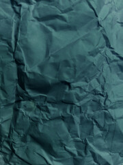  Abstract wrinkled or Free photo crumpled blue paperboard or empty canvas or paper surface with folded stains.