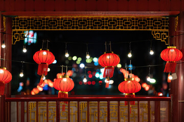red chinese new year lantern hanging beautifully In the Chinese New Year celebrations There is bokeh in the background, very beautiful. © Nutchapong Wuttisak