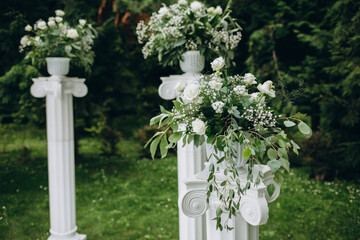 Wedding ceremony on the street on the green lawn.Decoration of a wedding celebration.