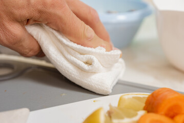 Closeup of male hands preparing to cook healthy food