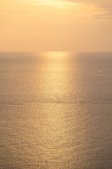 Obraz premium Twilight Golden time in the sea view of Phrom Thep Cape, the tropical sea sunset period, scenic point of Phuket Island, The Pearl of the Andaman Sea,Thailand popular for tourist in the world.