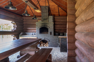 standard design classic wooden russian bath sauna interior with hot stones