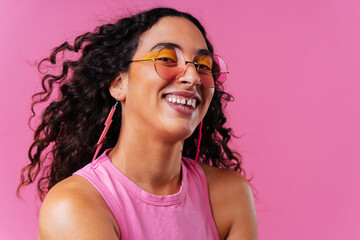 Creative studio portrait of beautiful hispanic woman with diastema - Cool, modern and unique female adult posing on colorful background, concepts about diversity, individuality and fashion - Powered by Adobe
