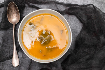 Vegetable cream soup with spinach in small bowl