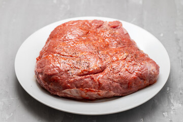 beef with marinate and black pepper on dish