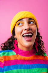 Creative studio portrait of beautiful hispanic woman with diastema - Cool, modern and unique female adult posing on colorful background, concepts about diversity, individuality and fashion