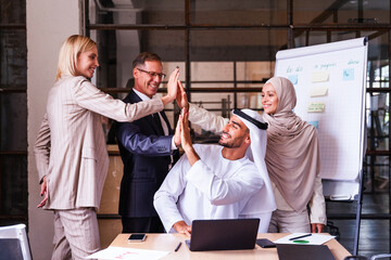 Multiracial group of corporate businesspeople working in a business office - Multiethnic...