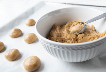Gingerbread cookies baking with fresh dough