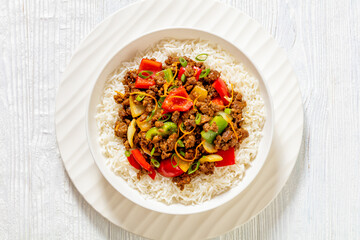 crispy ground beef with stir-fried veggies in bowl