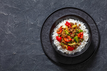 crispy ground beef with stir-fried veggies in bowl