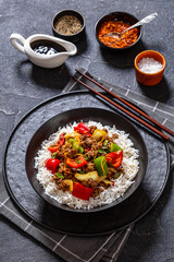 crispy ground beef with stir-fried veggies in bowl