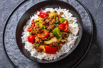 crispy ground beef with stir-fried veggies in bowl