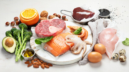 Food high in coenzyme Q10 on light gray background. Healthy eating concept. .Food high in coenzyme...