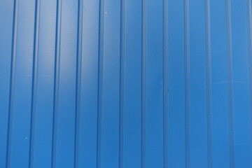Obraz premium Smooth surface of electric blue wall with plastic siding