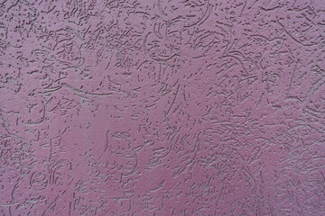 Backdrop - dusty purple wall with stucco worm finish