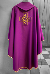 Purple chasuble of the priest inside the sacristy of a Catholic church