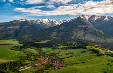 Obraz premium Beautiful view of Western Tatras mountains in Slovakia. Village Konska under and peak Baranec at background.