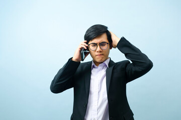 Portrait of businessman talking on phone.