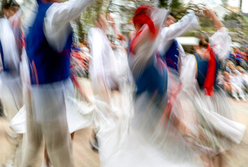 Traditional Slovak folk dance. Dancers in blurred motion
