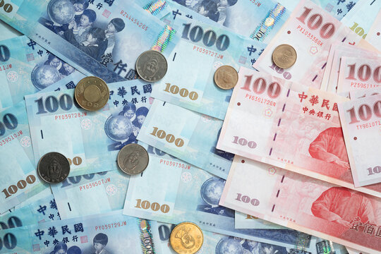 New Taiwan Dollar bill on white background. Red envelope packet chinese new year, hongbao on white background.