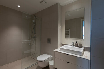Bathroom interior with glass shower cabin