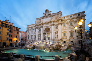 Naklejka na ściany i meble Amazing panoramic view with no people of famous Rome Trevi Fountain (Fontana di Trevi) in blue hour before sunrise, Rome, Italy.