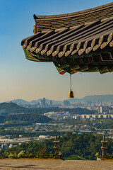 city behind old temple bell