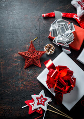 Various gift boxes with Christmas decorations.