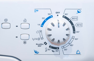 Control panel of white washing machine .