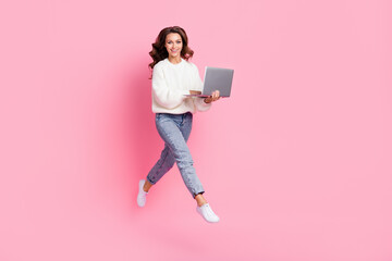 Full length photo of shiny pretty woman dressed pullover communicating device empty space isolated pink color background