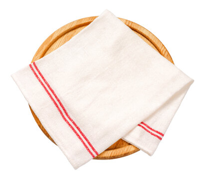 Napkin and board for pizza on white background. Top view of napkin on wooden round board isolated.