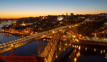 Fototapeta na wymiar Porto (Portugal city) night view with the bridge 